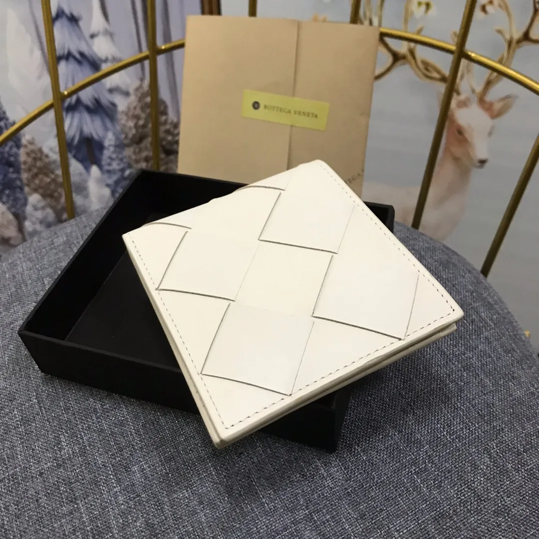 Padded leather wallet • 8 card slots, 1 bill compartment and 2 additional compartments • Check pattern nappa padding exterior • Smooth calfskin lining 993#